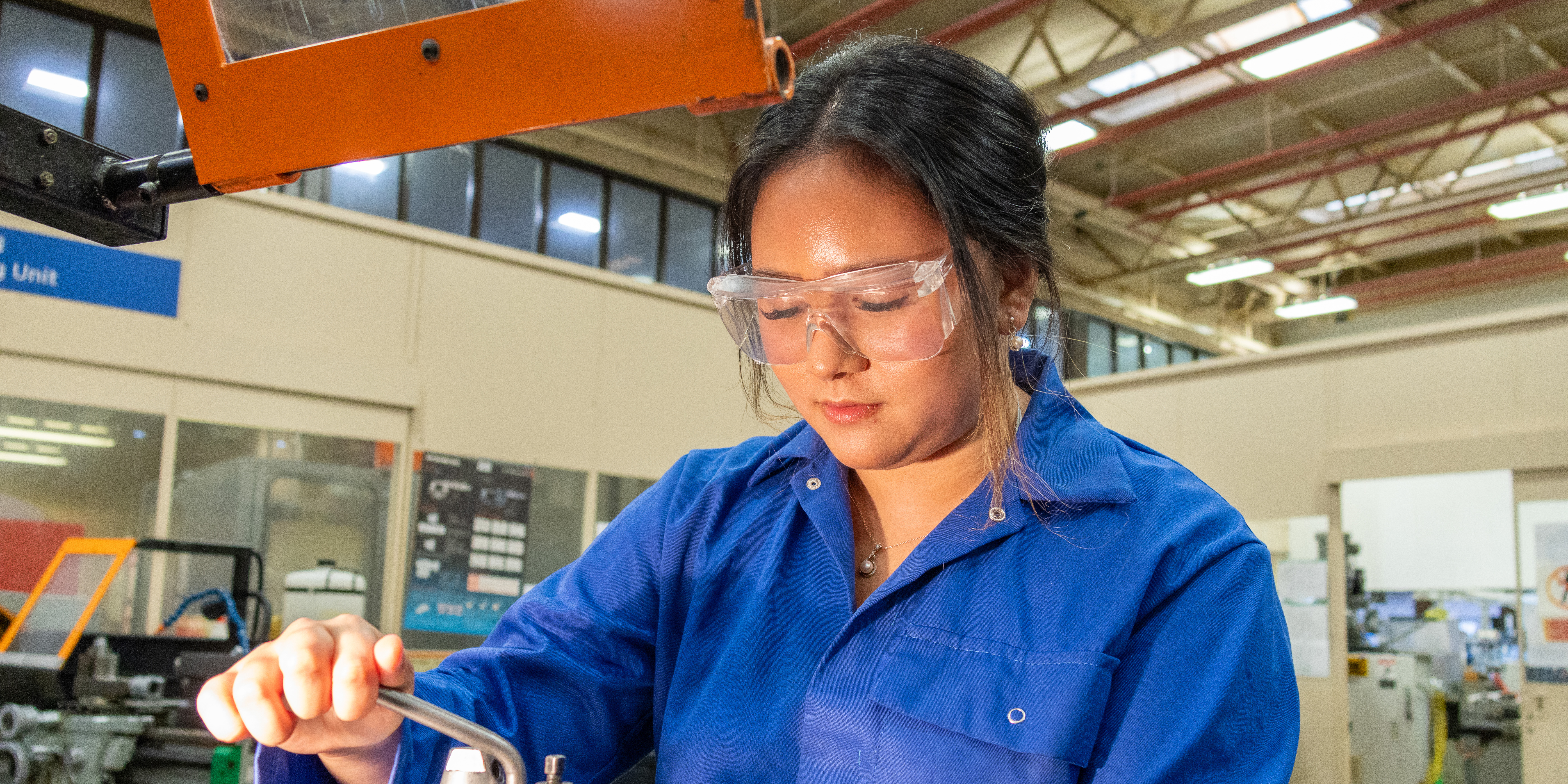 Student engineer at work in lab
