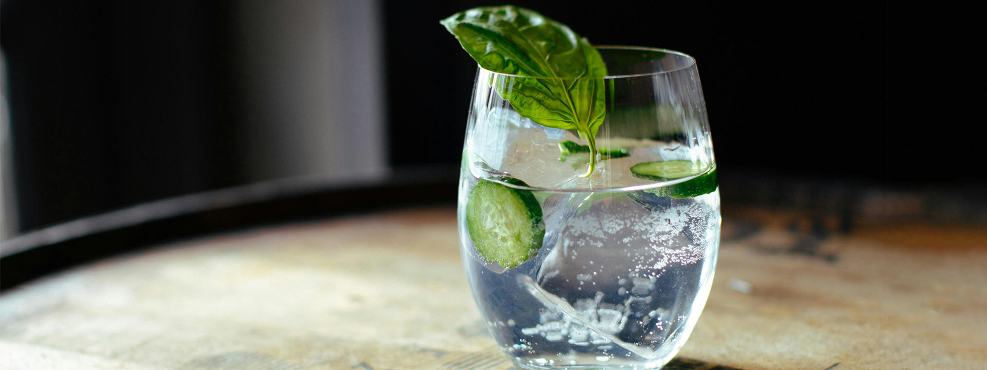 A glass of gin and tonic. Photo by Devin Berko on Unsplash.