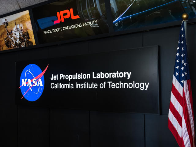 A digital screen at the Jet Propulsion Lab, California Institute of Technology displaying NASA logo