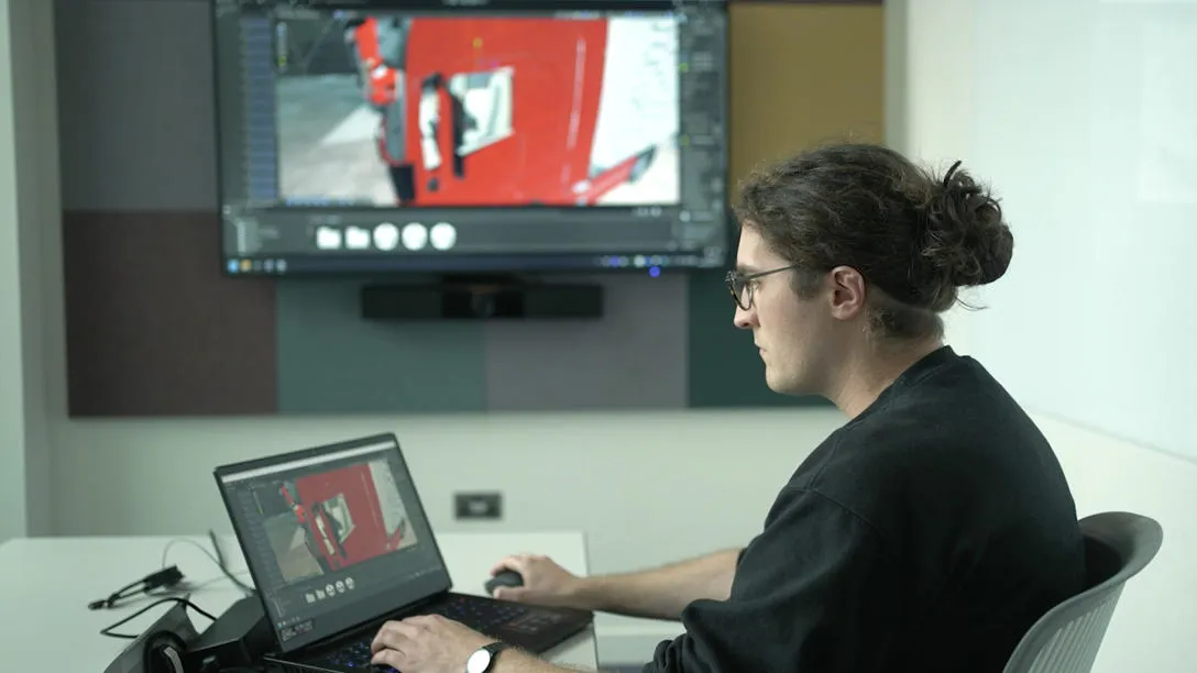 TransiT researcher Andrew Goodsell working on his virtual reality research for digital twinning. TransiT researcher Andrew Goodsell working on his virtual reality research for digital twinning.