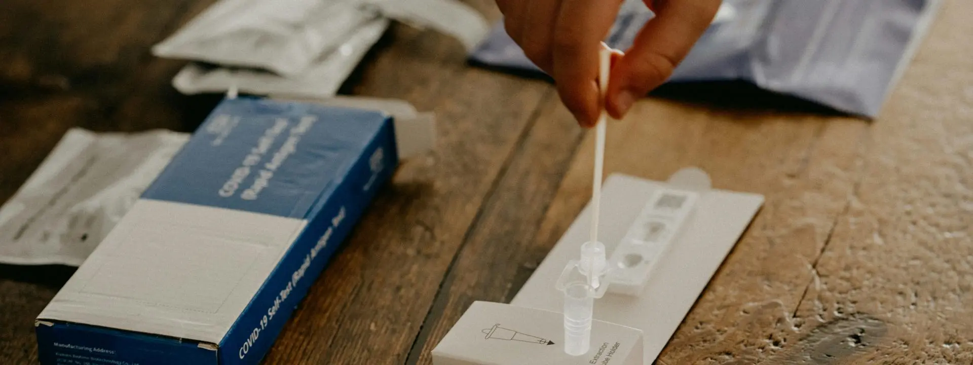 Image shows a COVID-19 test kit.