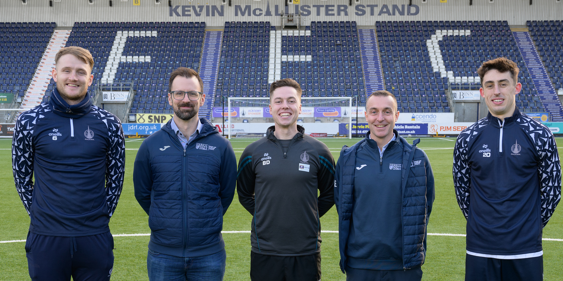 Group shot on the centre spot at the Falkirk stadium.