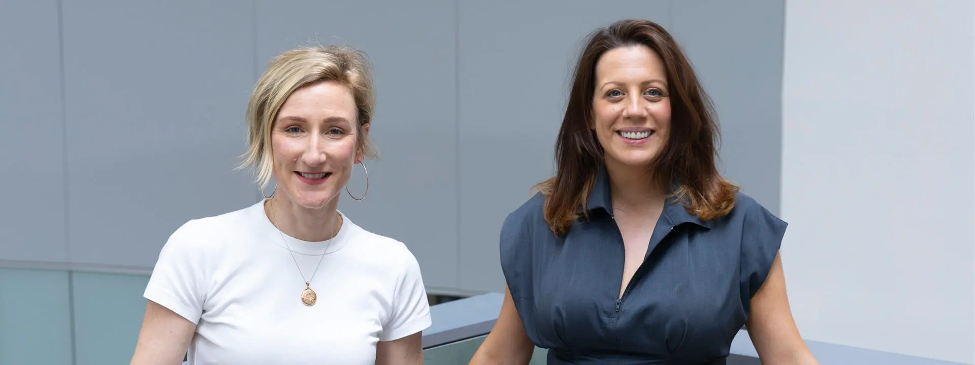 Jessica Mullen and Gemma Stuart standing in GRID Building, Heriot-Watt University, Edinburgh campus