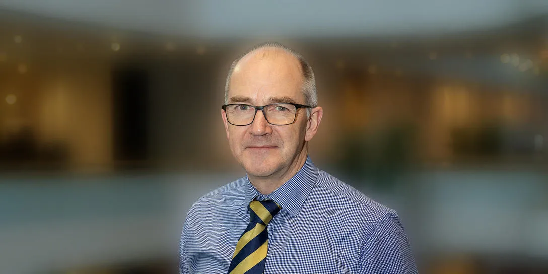 Formal head and shoulders shot of Prof Andrew Cairns