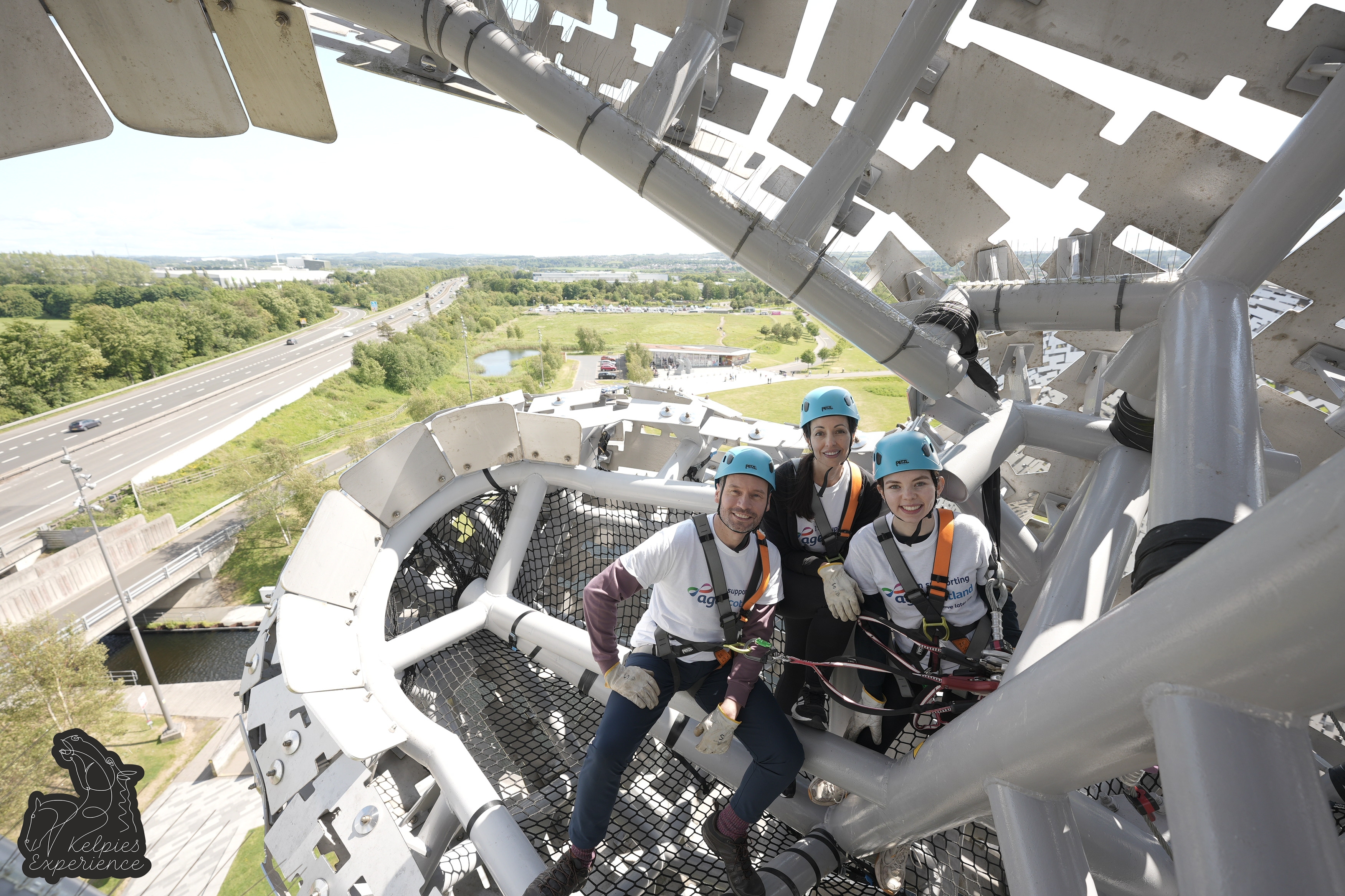 Picture shows the Heriot-Watt team sitting at the summit of the Kelpies.