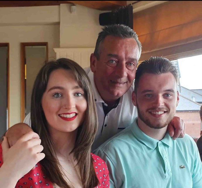 Image shows Caitlin Cummings pictured with her father John and brother Scott.