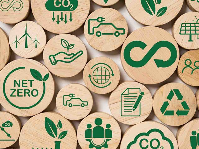 Image shows a selection of images and symbols representing environmental sustainability.