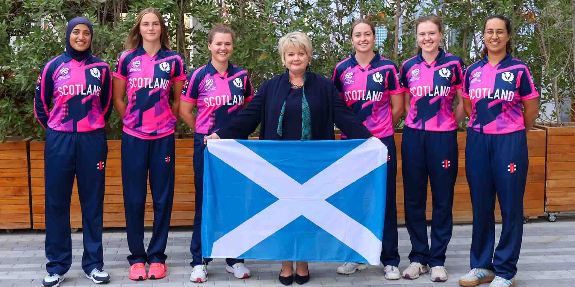 Professor Dame Heather McGregor pictured with members of the women's squad. 