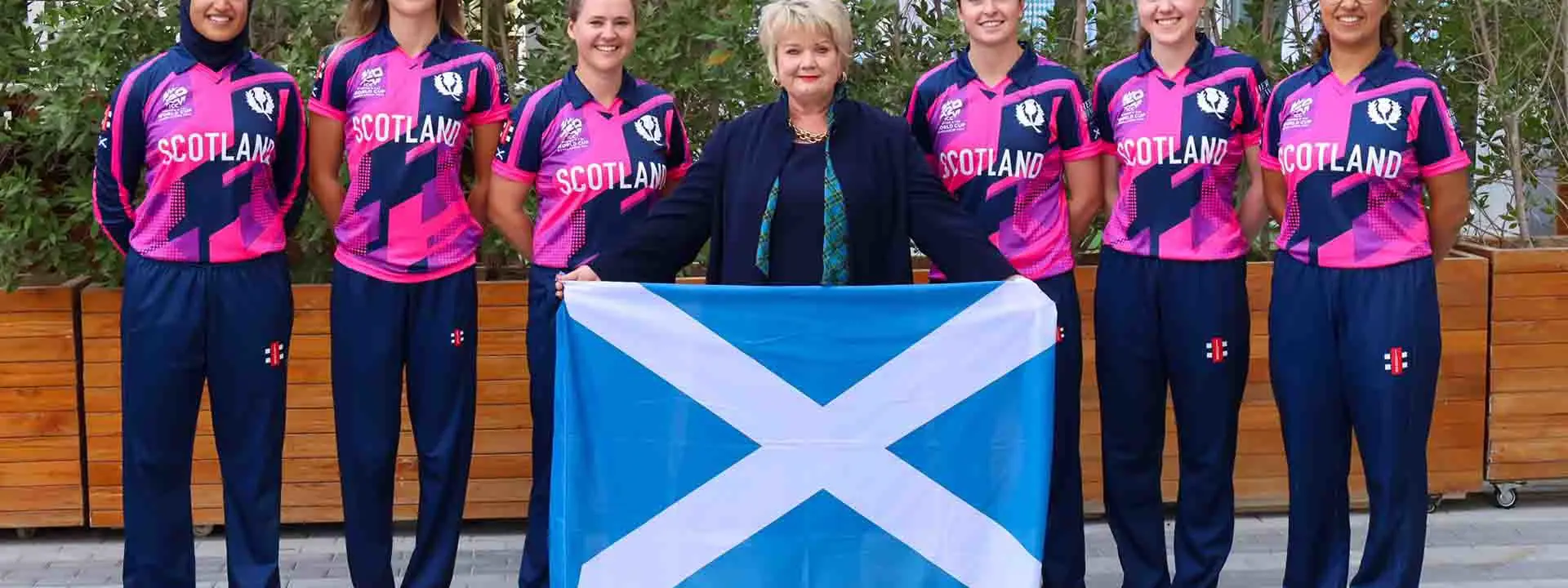 Professor Dame Heather McGregor pictured with members of the women's squad.