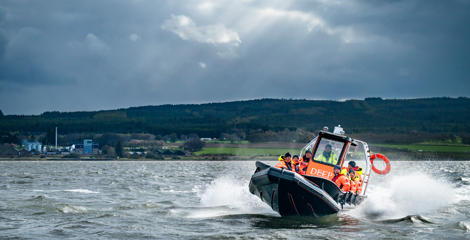 DEEP boat in front of Glenmorangie Distillery. Credit: Charné Hawkes Photography.
