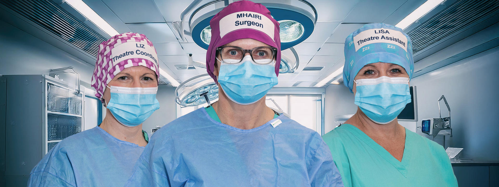 Hospital clinicians wearing theatre caps.