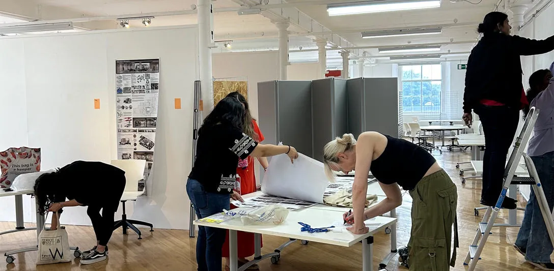 Postgraduate students at Heriot-Watt School of Textiles and Design setting up for the show. Postgraduate students at Heriot-Watt School of Textiles and Design setting up for the show.