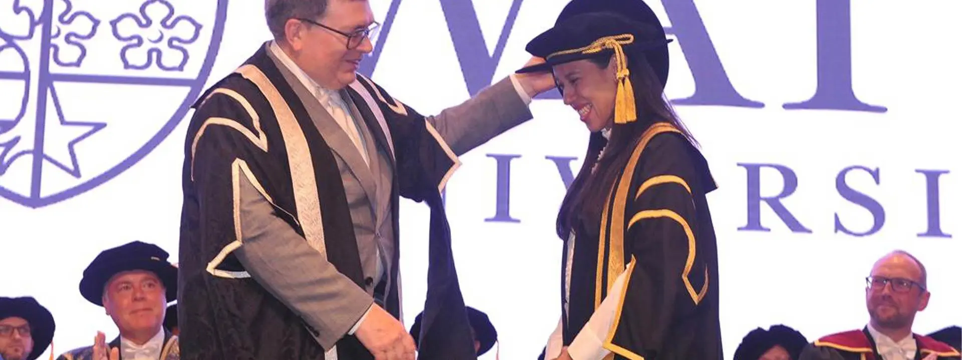 Datuk(Dr) Nicol Ann David receives congratulations from Professor Richard A. Williams.