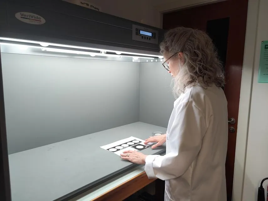 Comparing samples using the new scale. The scale being used in a lab.