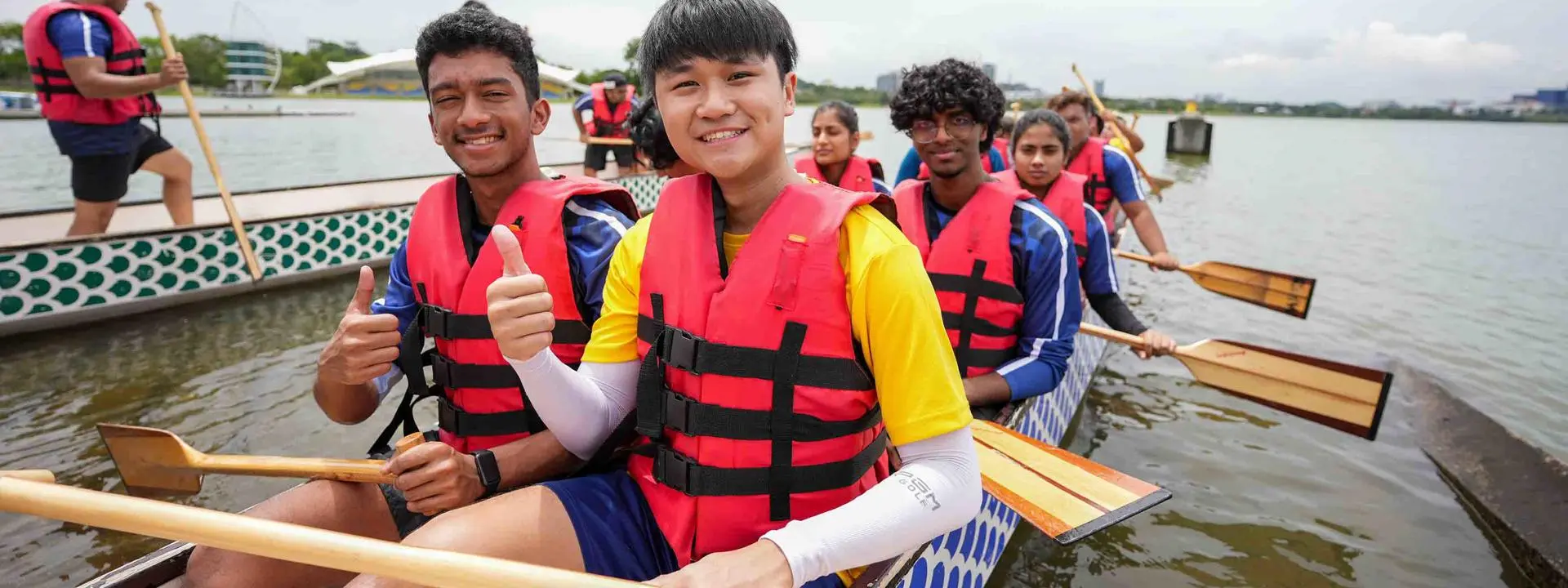 Image shows students participating in the Dragon Boating sessions.
