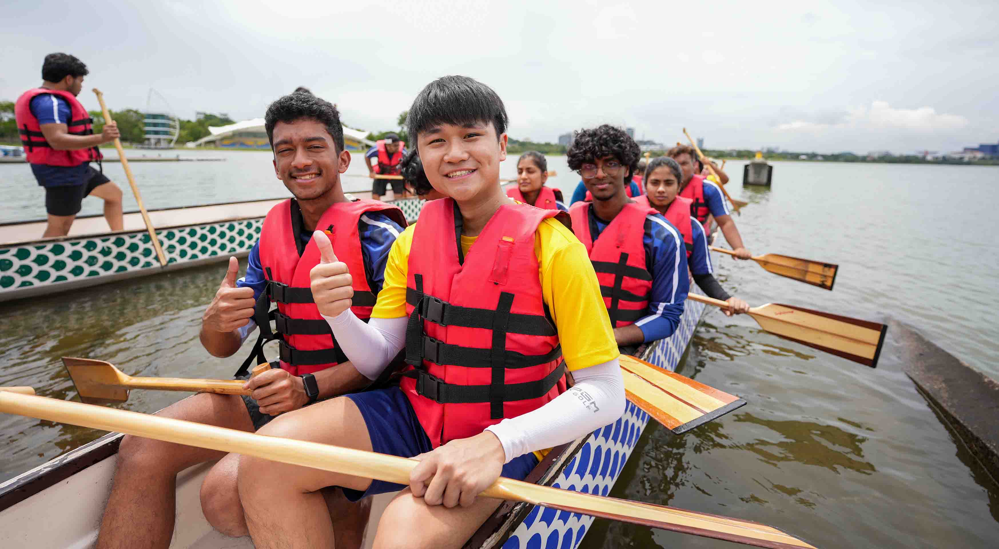 Image shows students participating in the Dragon Boating sessions.