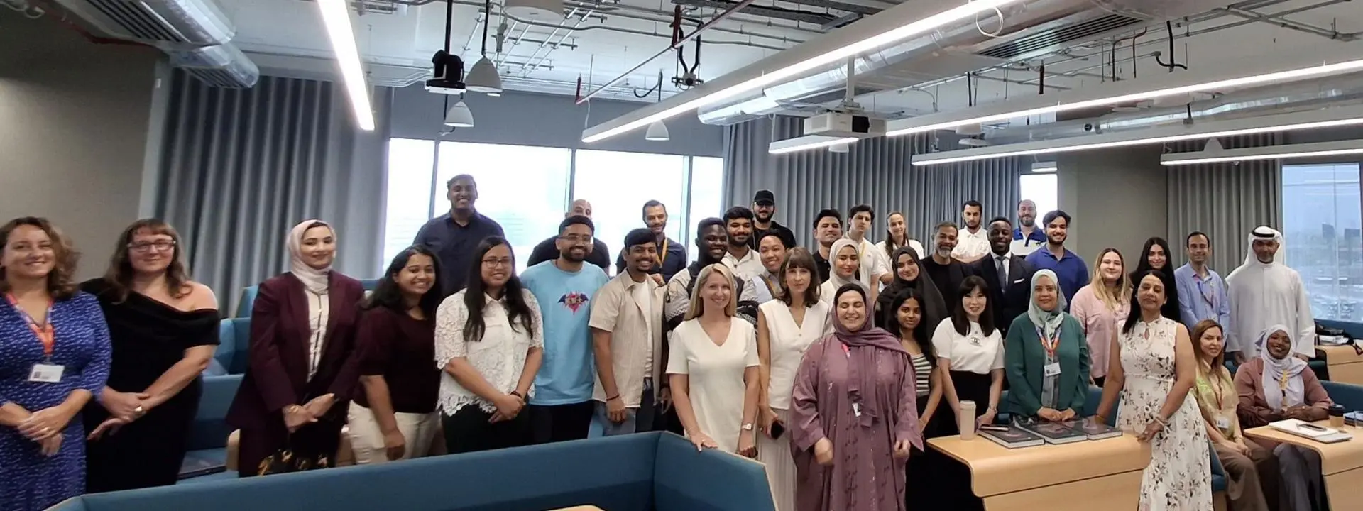 EBS global incubator Cohort 3 alongside incubator staff inside a classroom