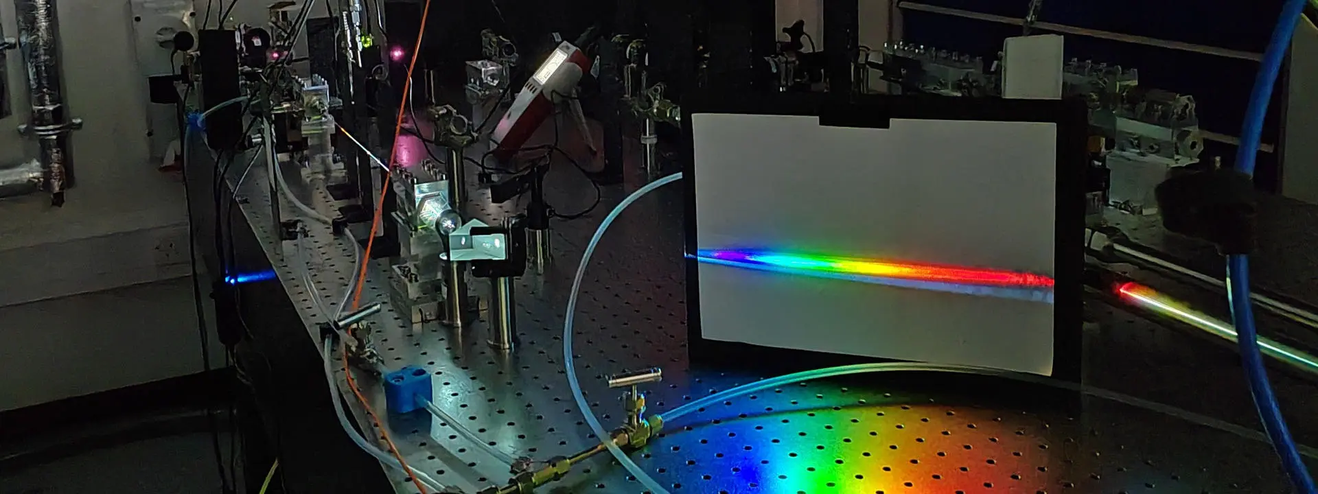Lasers in a lab.  Dr Christian Brahms is building a new type of light source for extremely fast laser pulses.