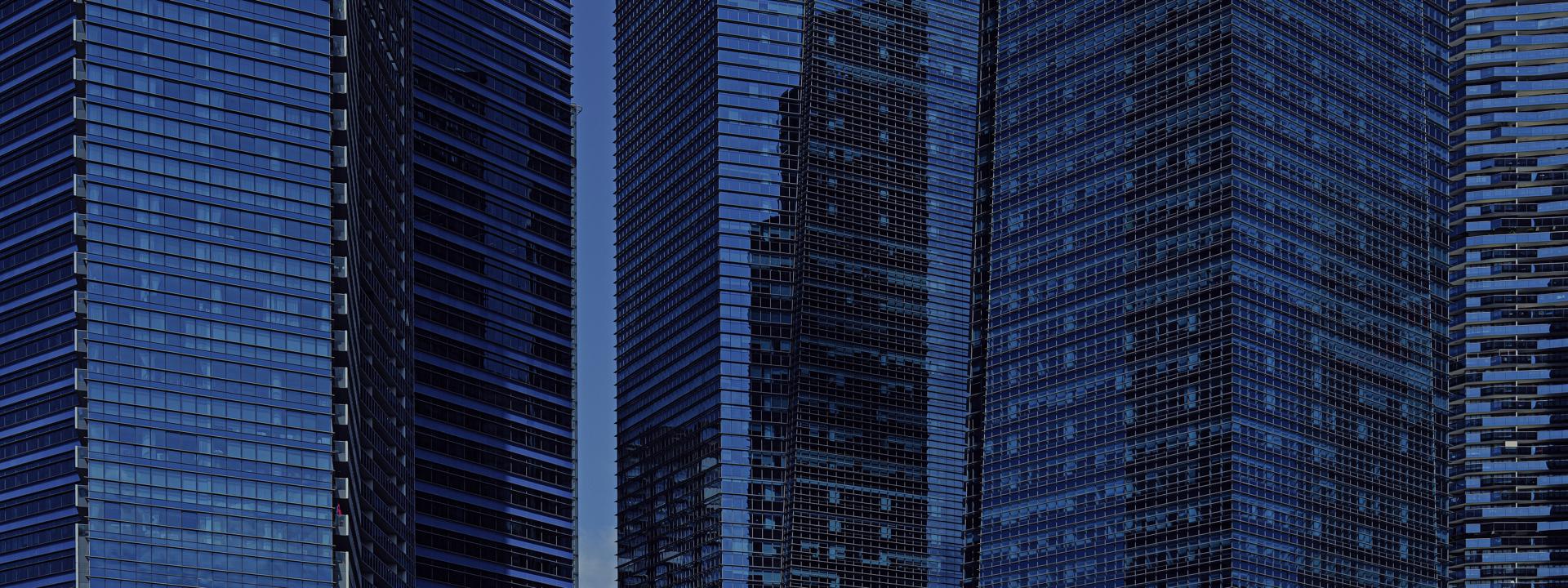 A horizontal view of glass buildings