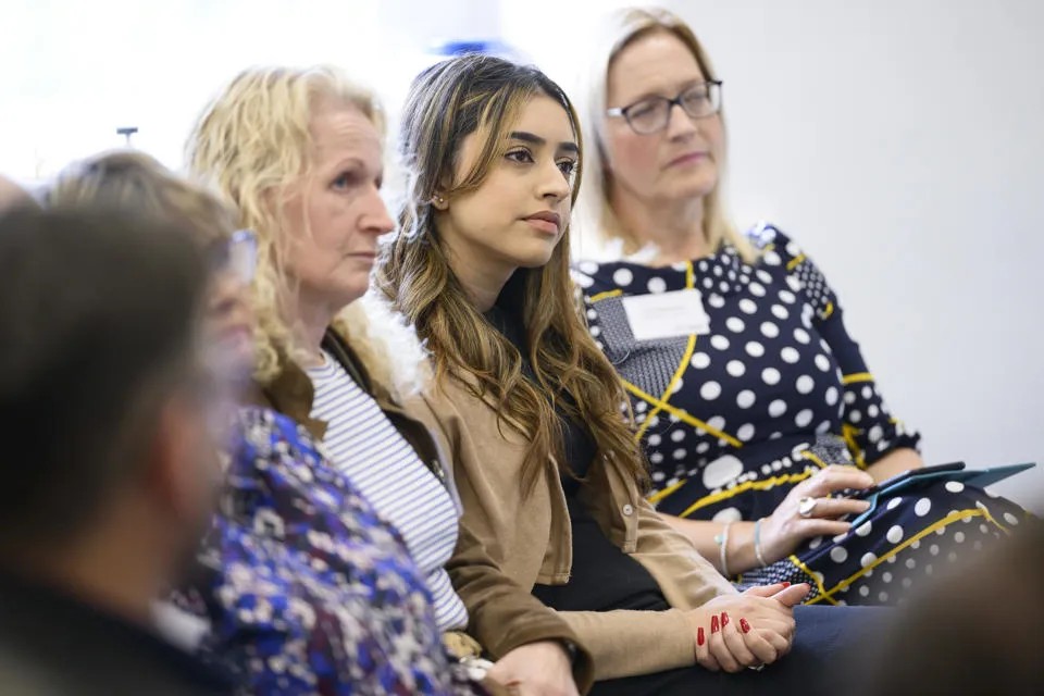 Attendees learned more about Heriot-Watt's talent partnerships - from Knowledge Transfer Partnerships (KTPs) to Graduate Apprenticeships (GAs) A row of people seated listening to a presentation.