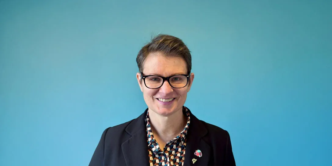 Formal head and shoulders shot of Prof Eugenie Hunsicker