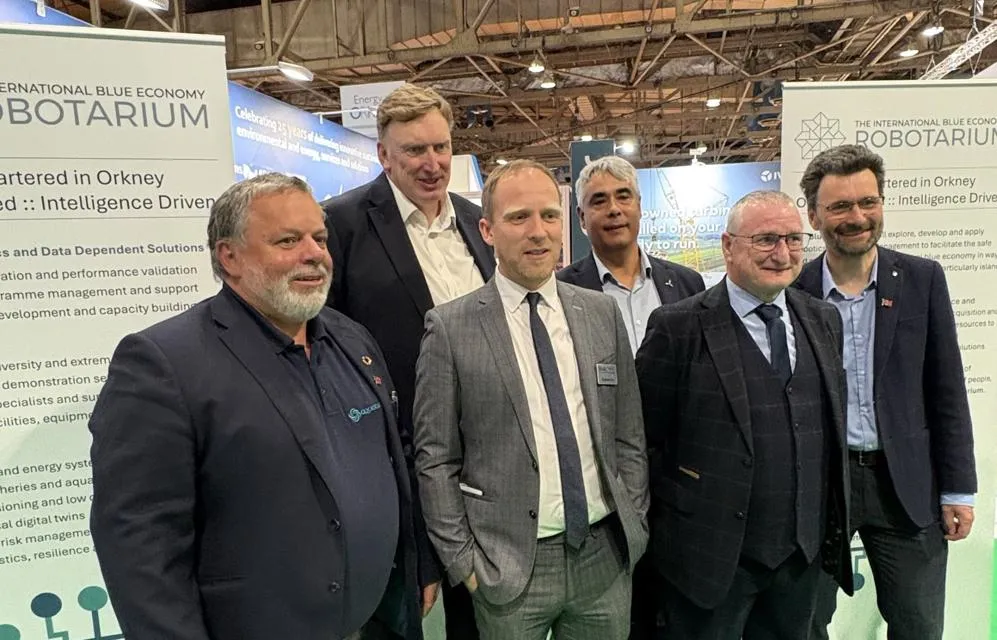 Stewart Miller (2nd left) and Professor Sandy Kerr (furthest right) launched the 'Blue Robotarium' with industrial partners at All-Energy 2025 A group photo related to the International Blue Economy Robotarium