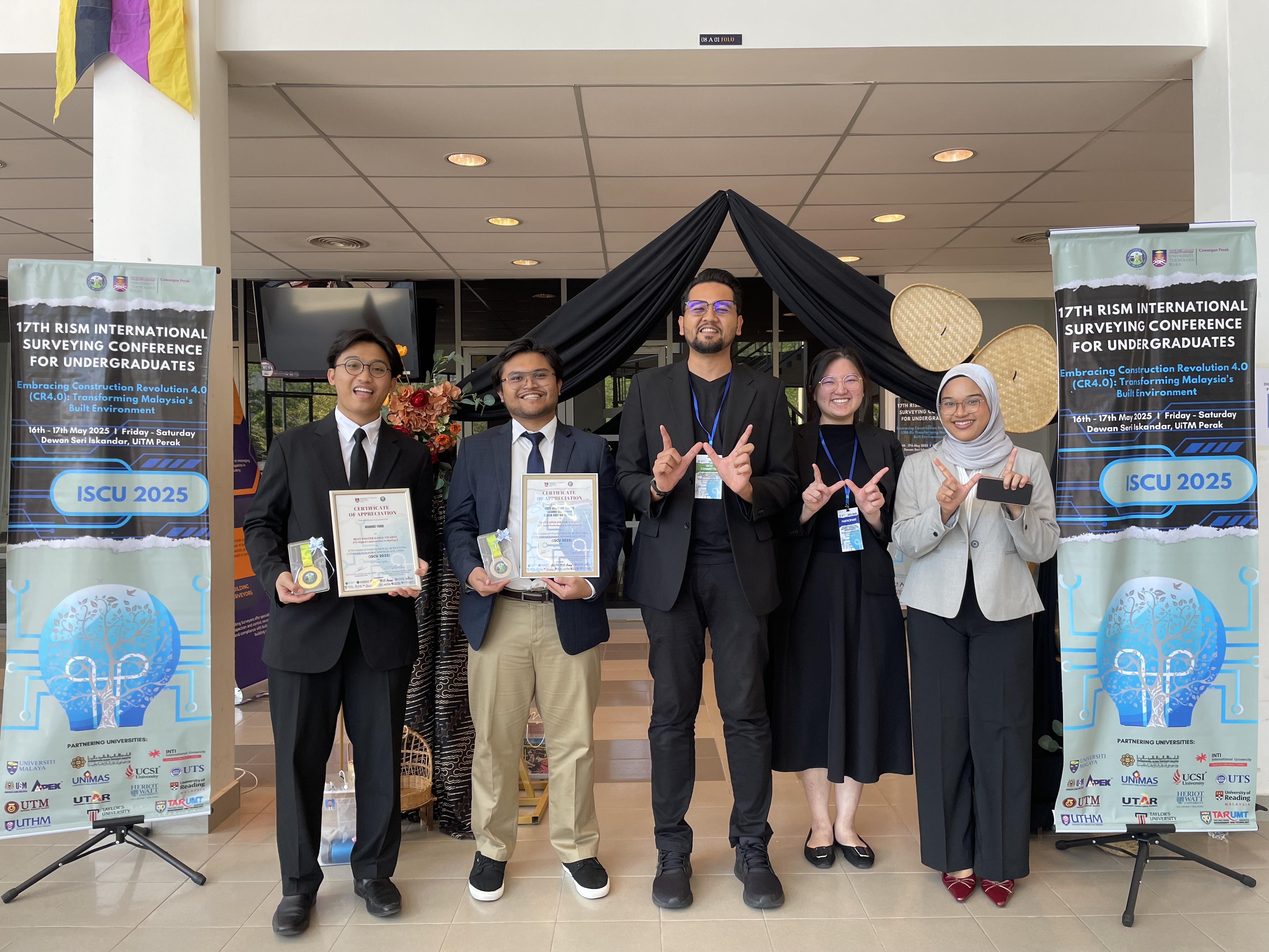 Five Heriot-Watt University Malaysia representatives at the 17th ISCU, including their supervisor, Dr. Azreen Ariff Bin Zulkeflee.