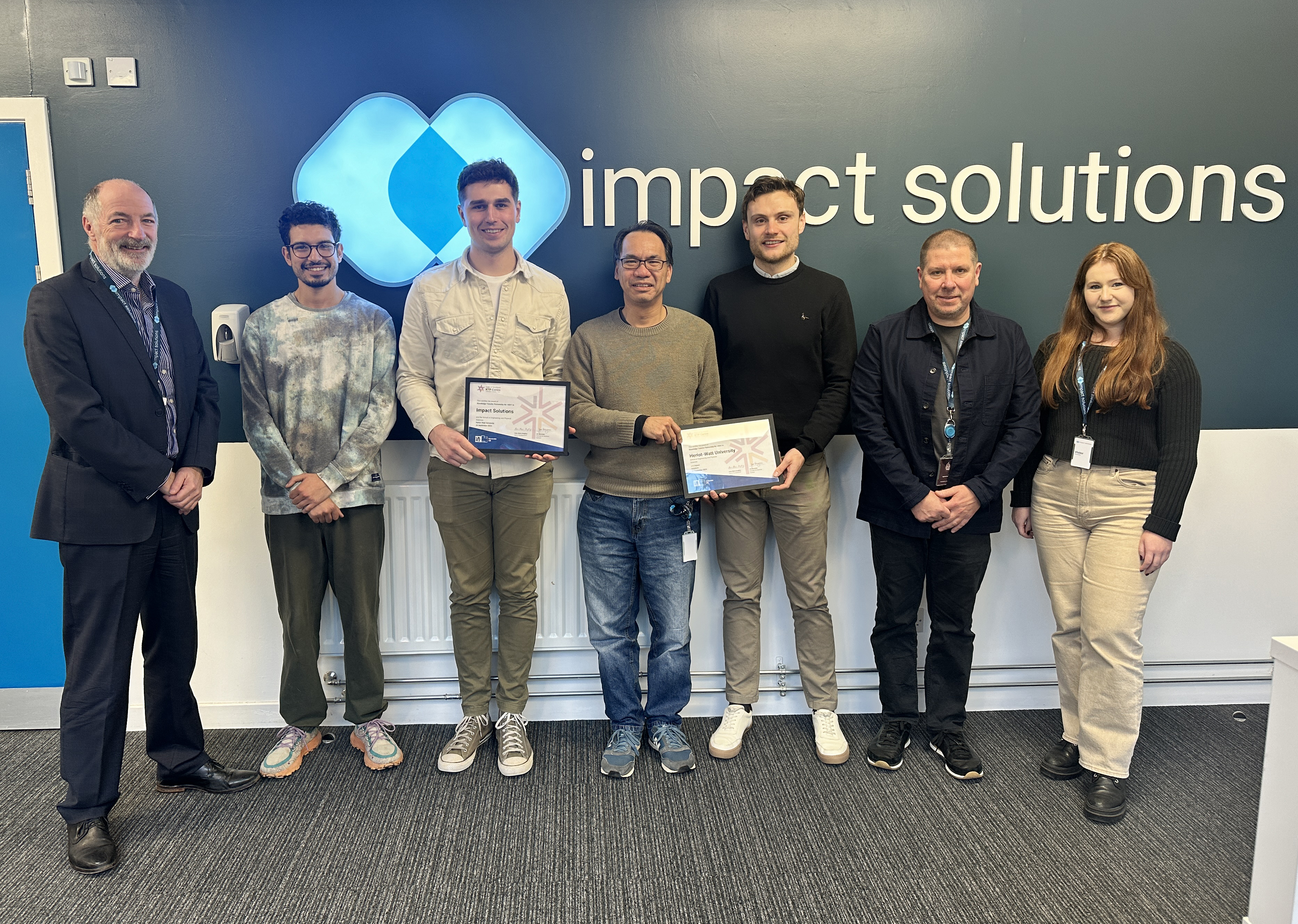 Impact Solutions and Heriot-Watt University presented with the Knowledge Transfer Partnership certificate award.