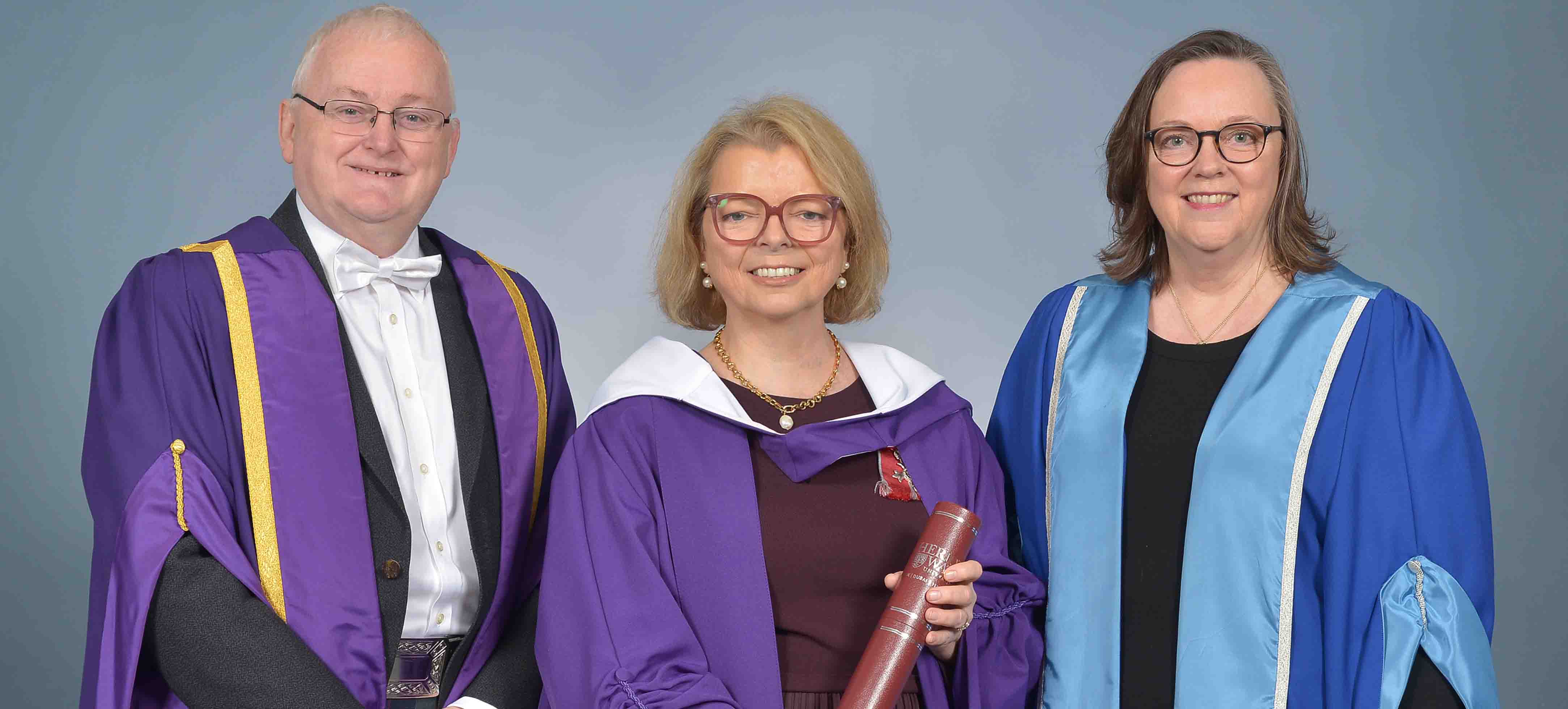Group shot of Jen Hardy and two Heriot-Watt academics.