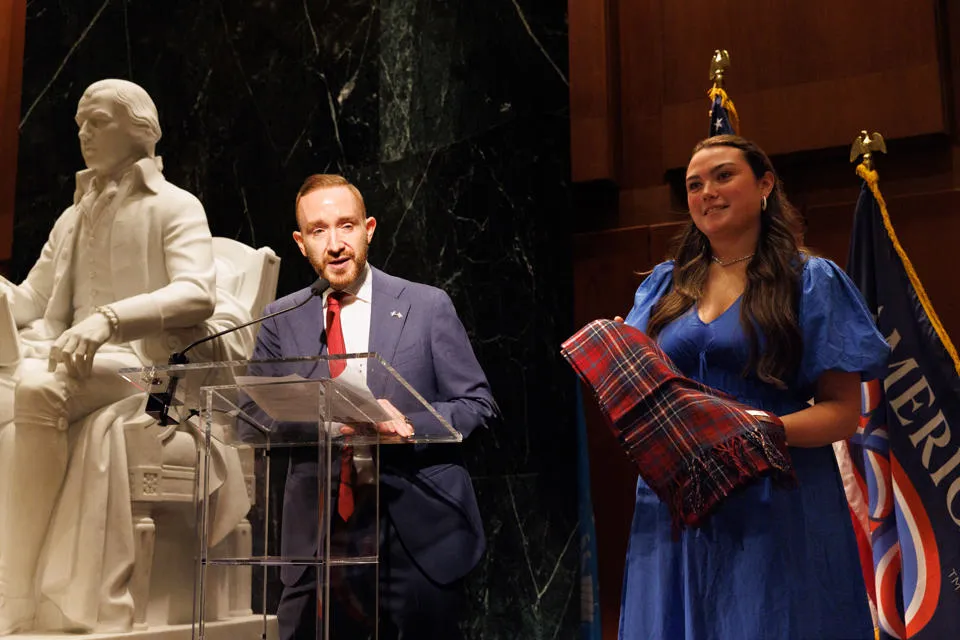 Kaci on stage with her tartan