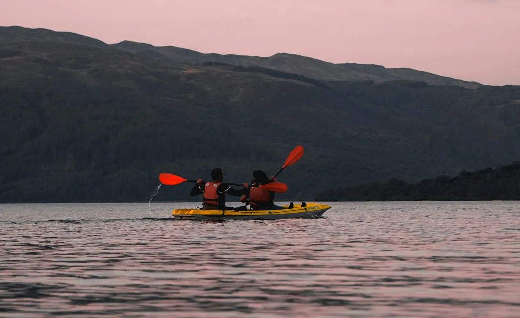 Kayaking in Scotland. Photo by JM on Unsplash.
