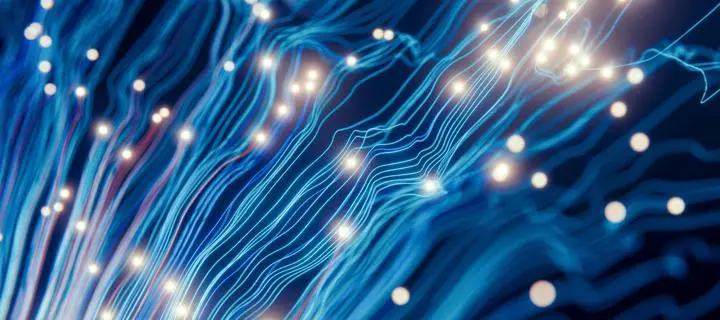 An AI themed image with blue wires with bright lights at the end of them that look like neurons,