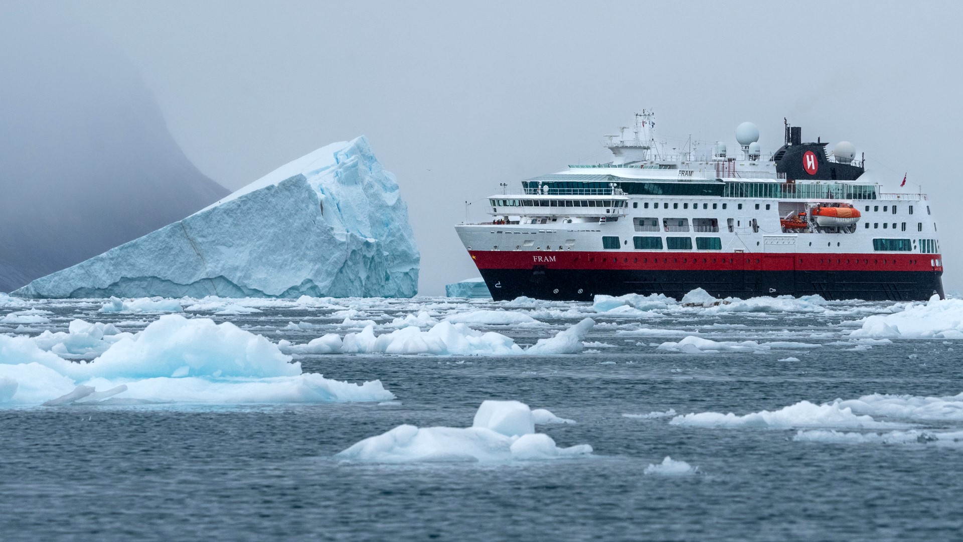 HX passenger ship MS Fram at Eqip Sermia, a glacier in Greenland. Credit: Yuri Choufour.