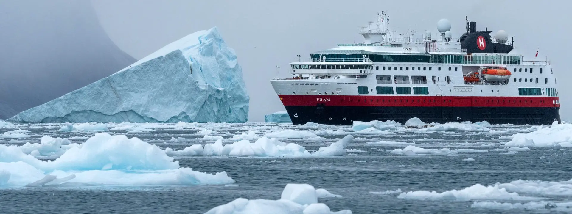 HX passenger ship MS Fram at Eqip Sermia, a glacier in Greenland. Credit: Yuri Choufour.