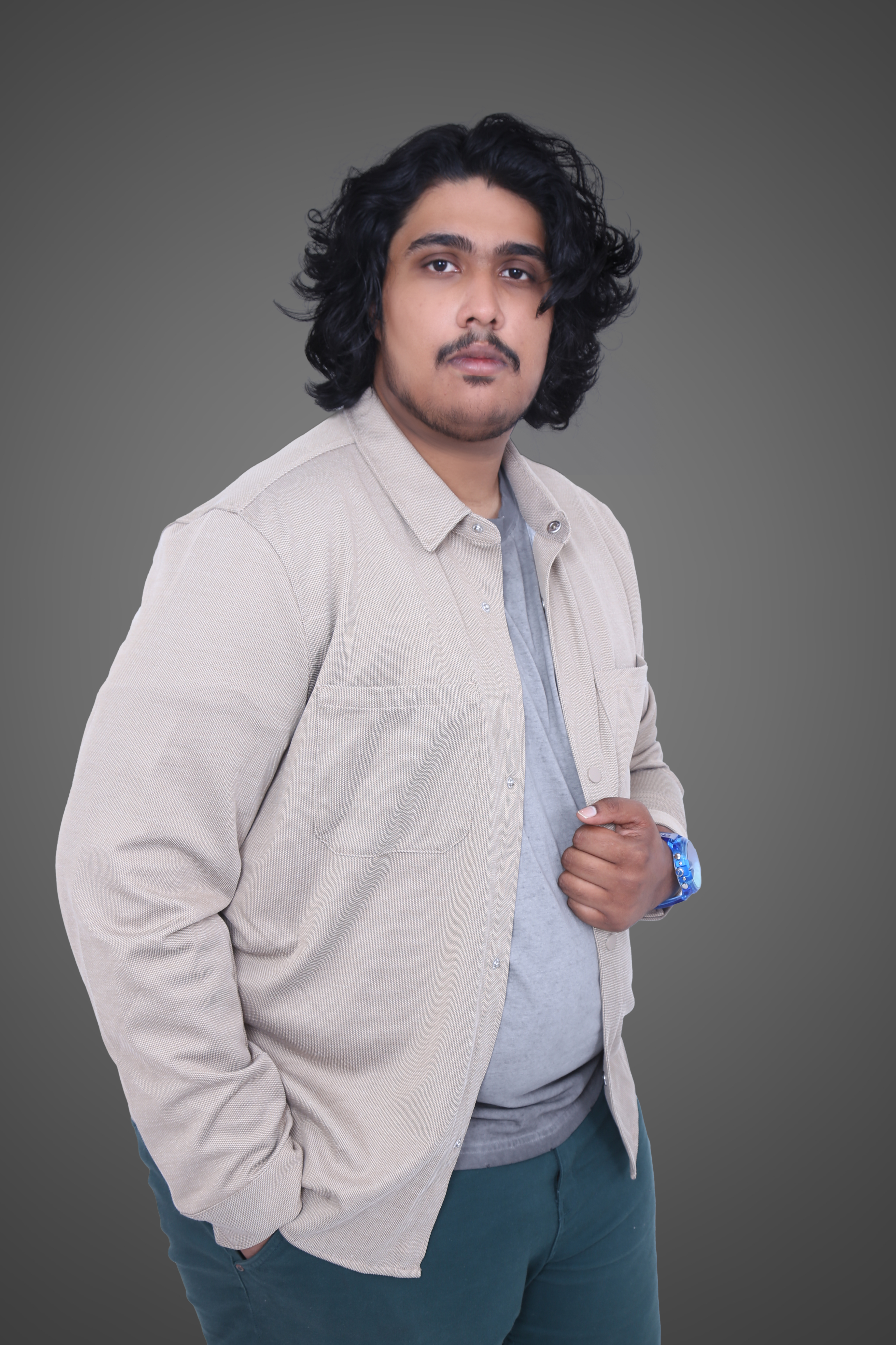 Nakhul Kalaivanan standing facing the camera.