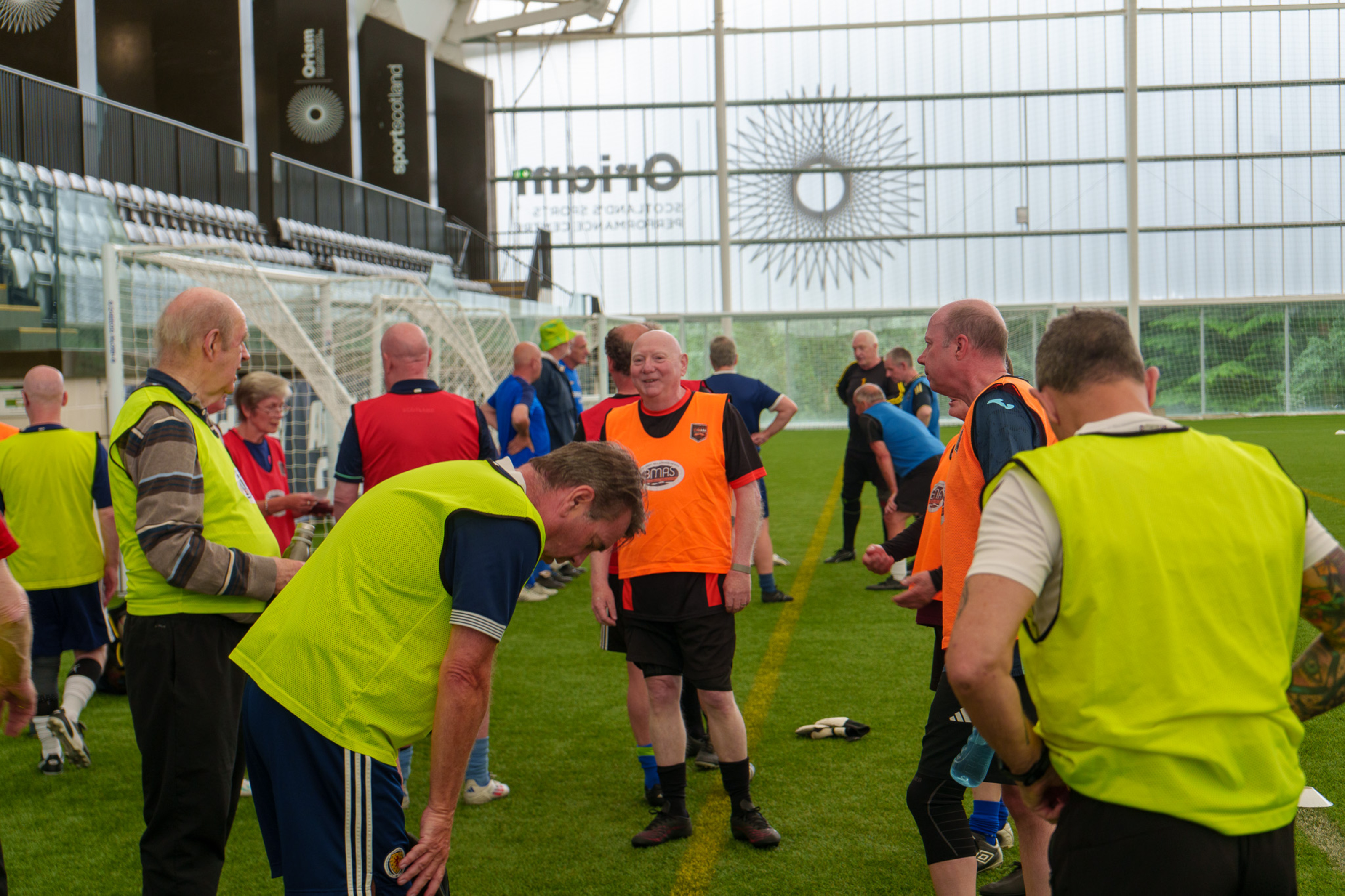 Players on the indoor football pitch at the Oriam