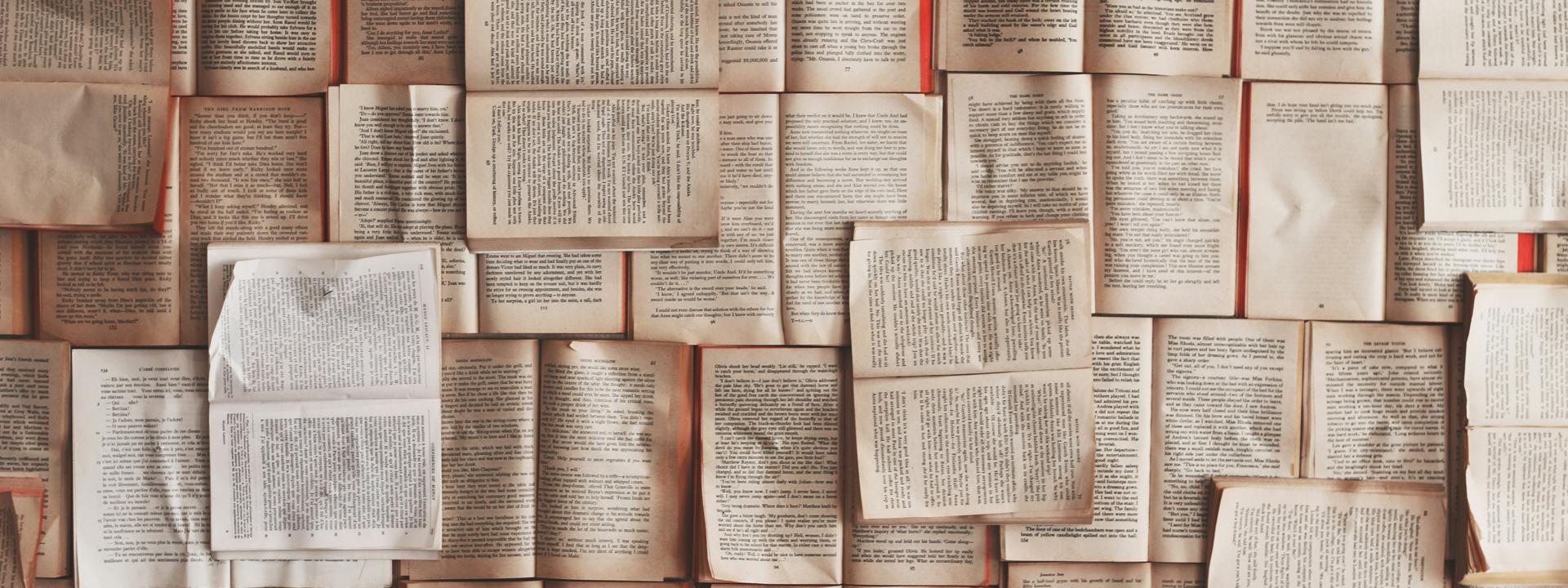 A picture of research papers across a table