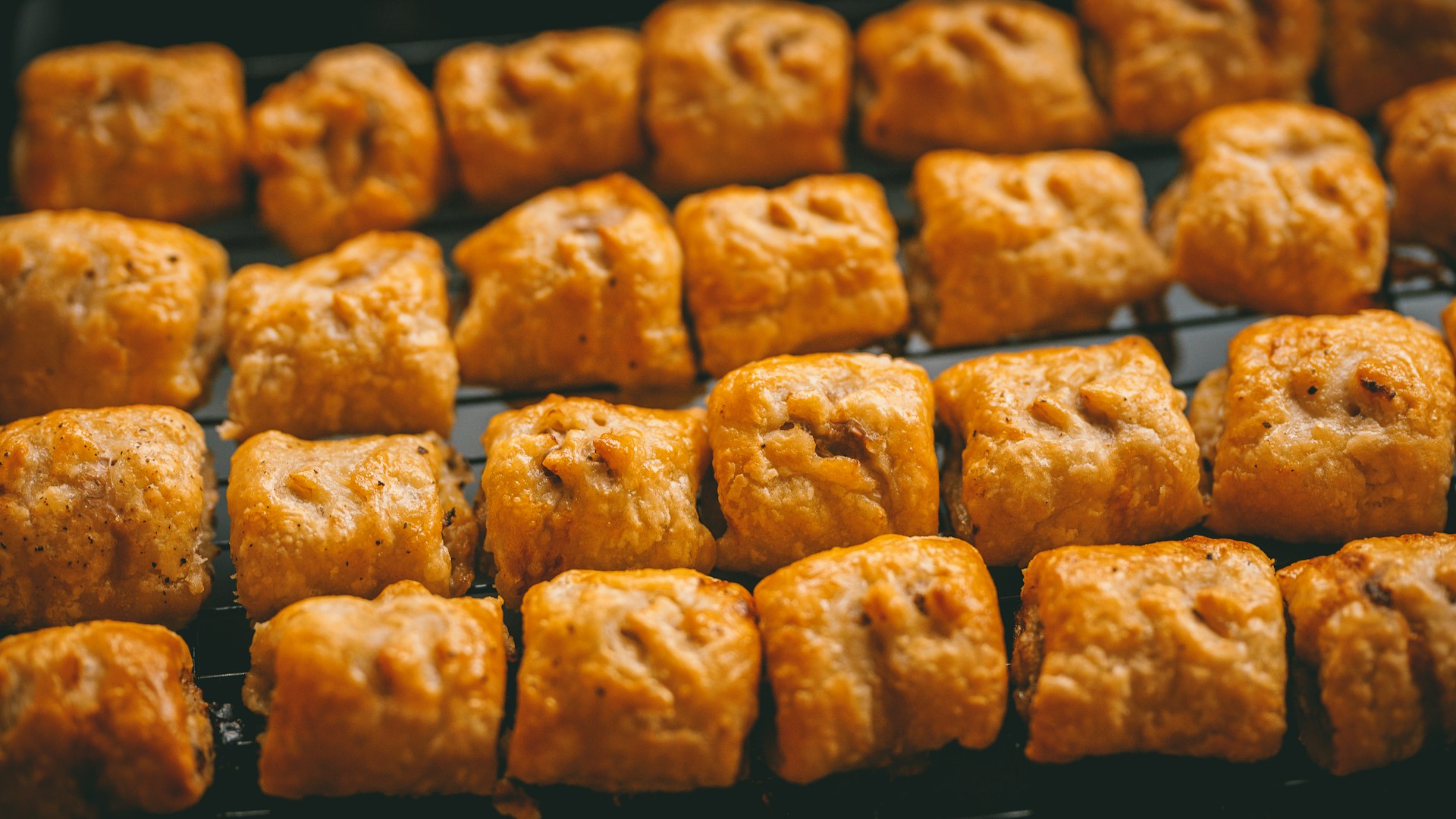 Photo by Rob Wicks on Unsplash - Sausage rolls 