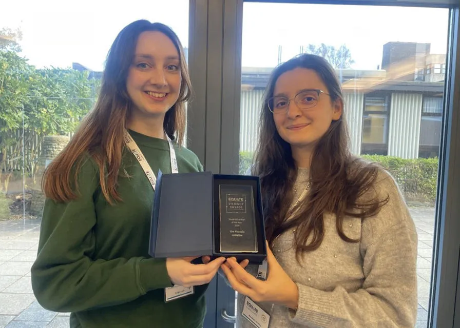 MACS PhD students Kaytlin Louth (left) and Anastasia Istratuca receiving the Equate Scotland prize, which supports women and underrepresented groups in STEM.