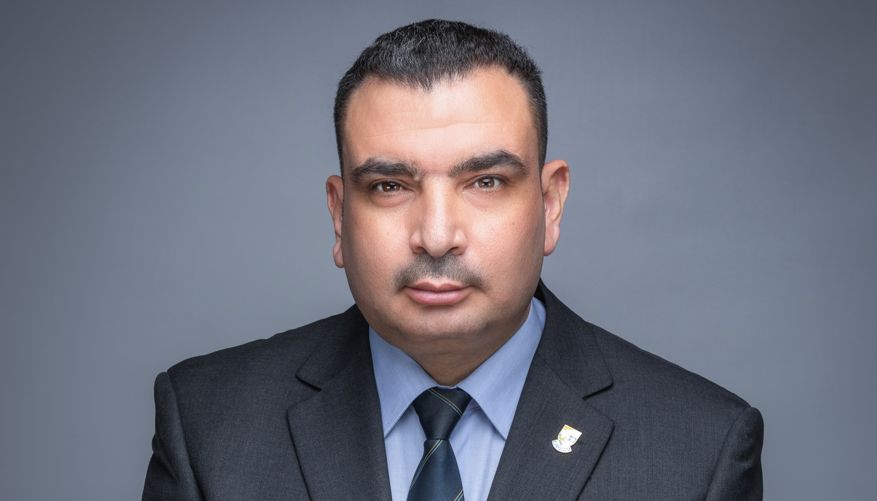 Professor Rabee Rustum, School of Energy, Geoscience, Infrastructure and Society Professor Rabee Rustum in a grey suit with a light blue shirt and dark blue tie.
