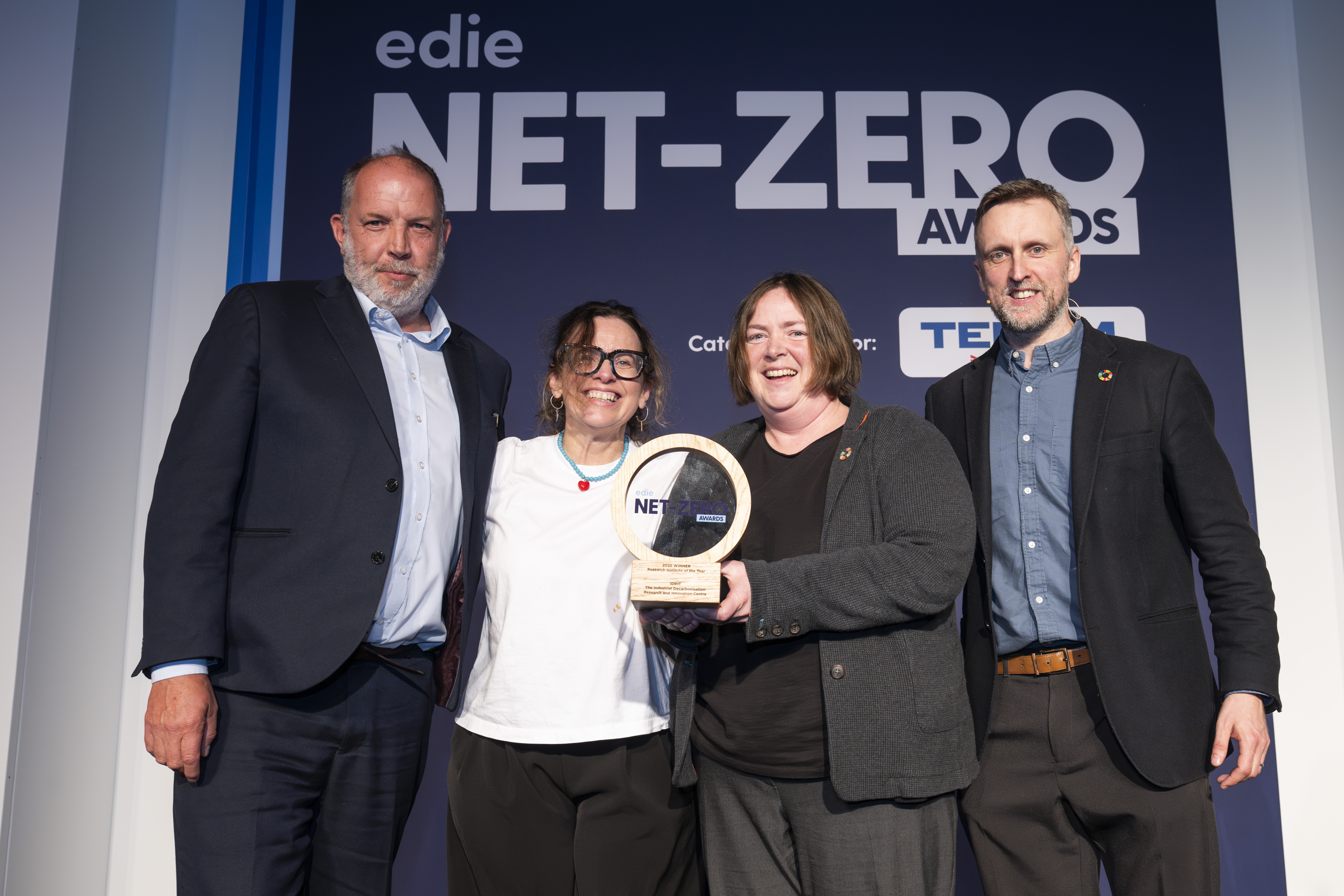 Members of the IDRIC team with their award