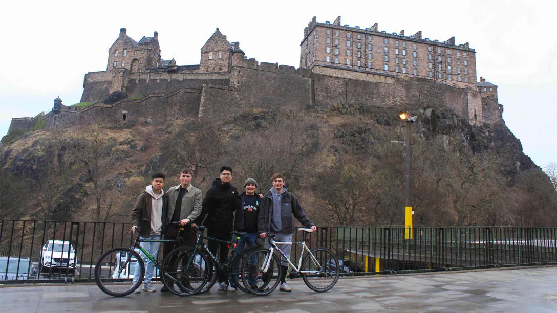 Heriot-Watt student cyclists at Edinburgh Castle. From left to right: Kah Rick Fong, Dominic Gurney, King Jun Siew, Oli Munn and Jay Berry. Heriot-Watt student cyclists at Edinburgh Castle. From left to right: Kah Rick Fong, Dominic Gurney, King Jun Siew, Oli Munn and Jay Berry.