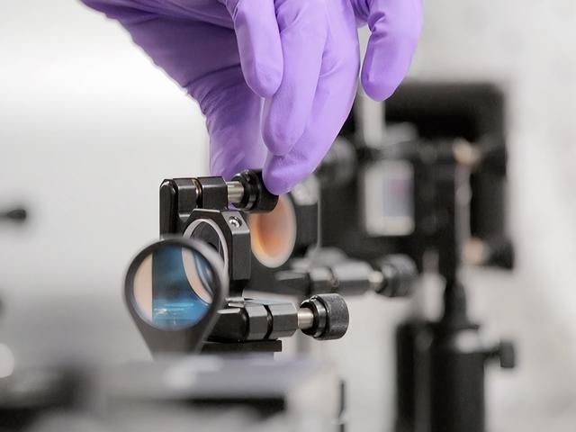 Scientists work with lasers in one of the Renishaw collaboration projects.