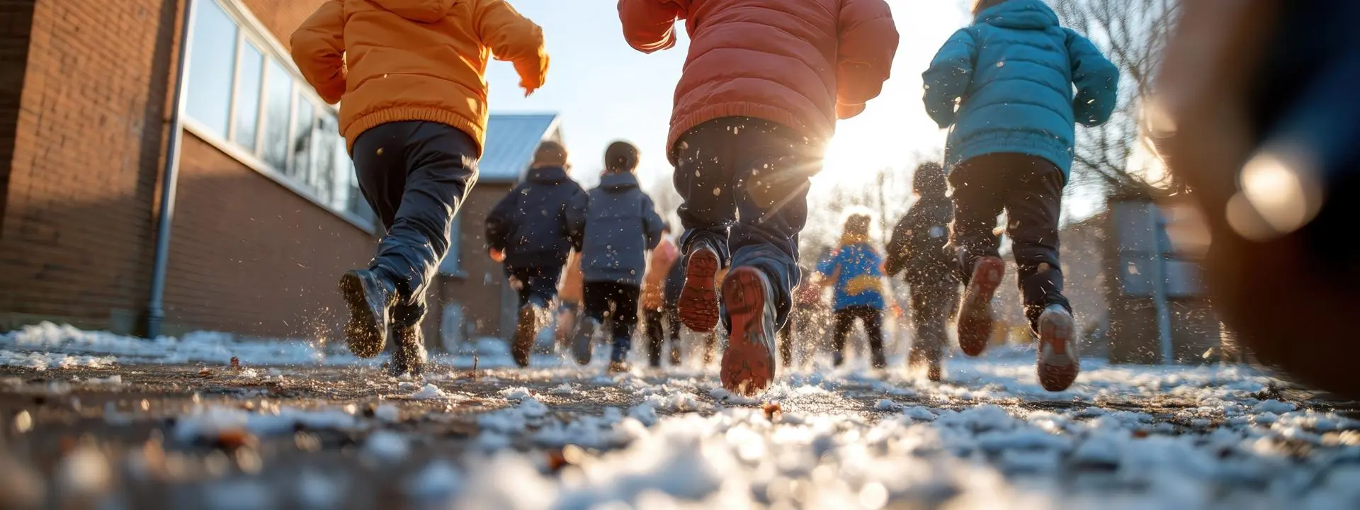 Children running in winter weather