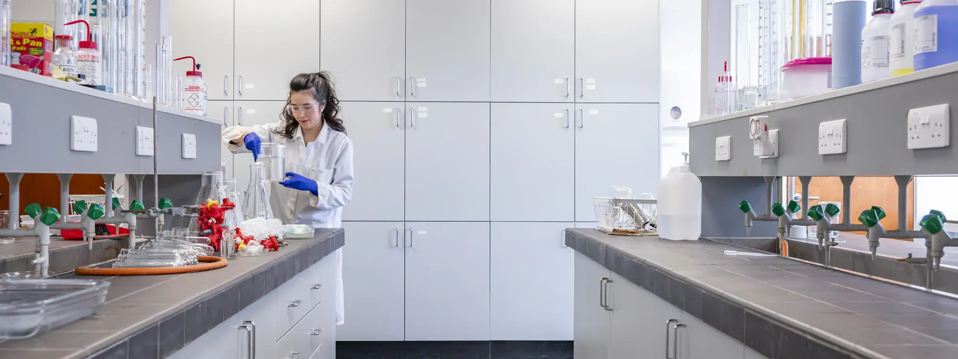 A woman scientist at work in a lab
