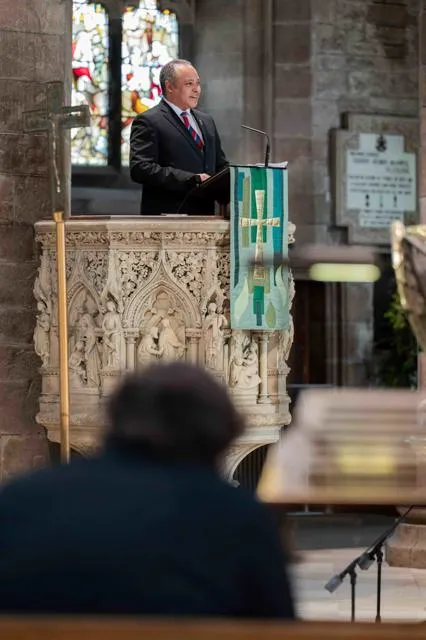 Dr Ralph Palmer Gilhooly, son of Sir Geoff Palmer, addressing the congregation.