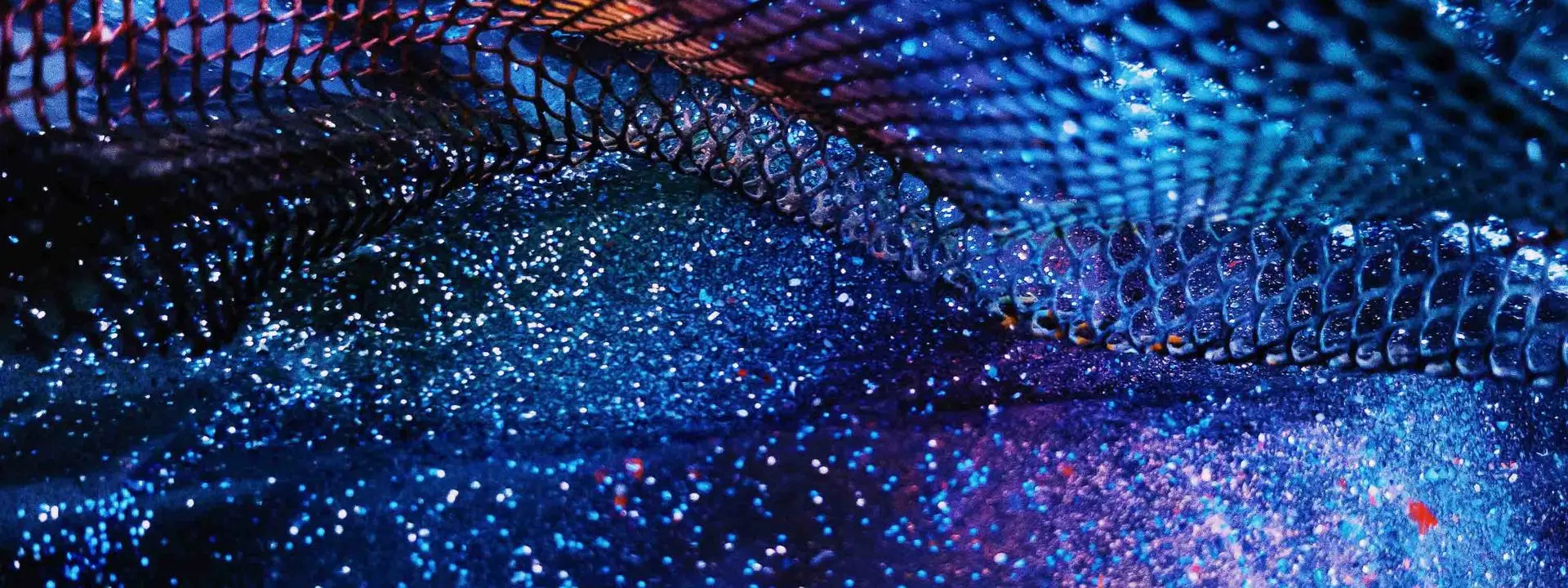 A starry blue and purple mesh, blending colours to form a celestial design.
