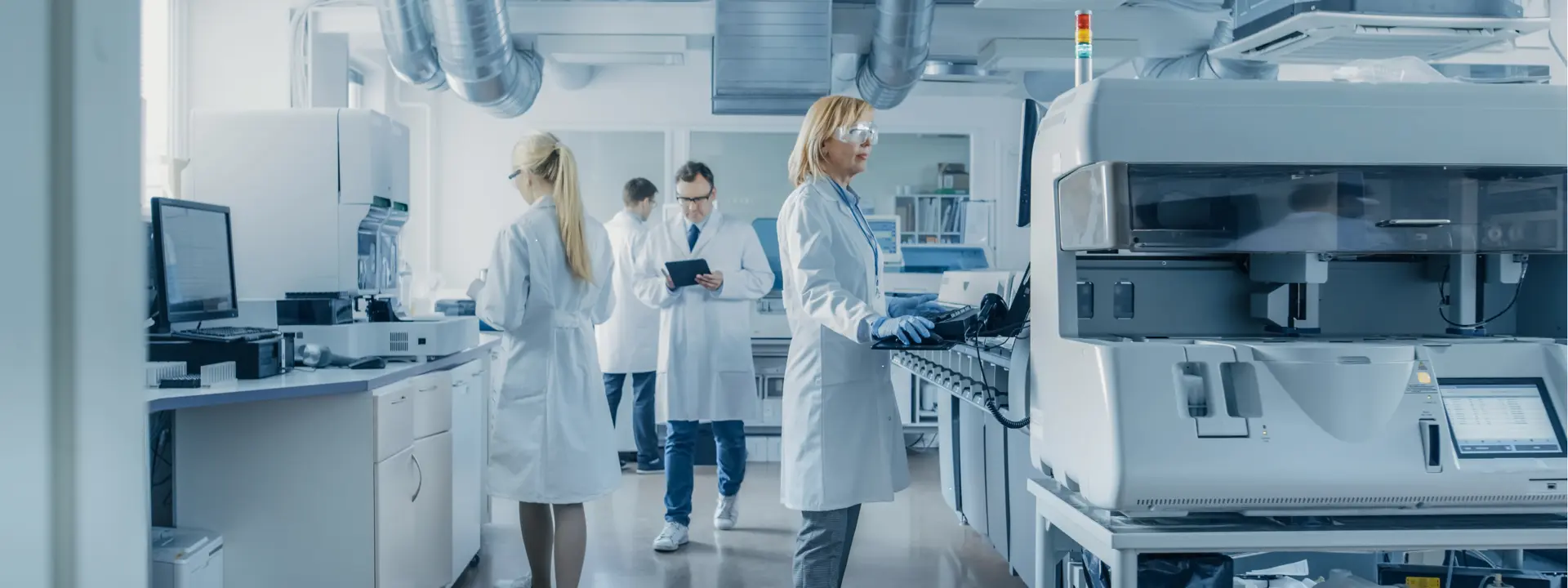 People working in a lab creating medical devices