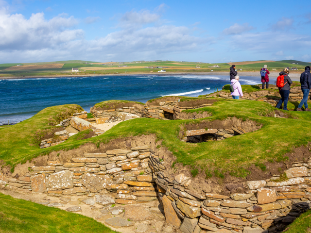 An ancient ruin sat beside a long coastline