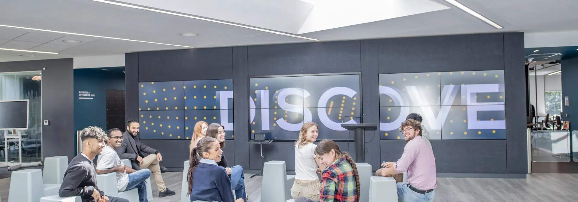 A group of students smiling and enjoying an event.